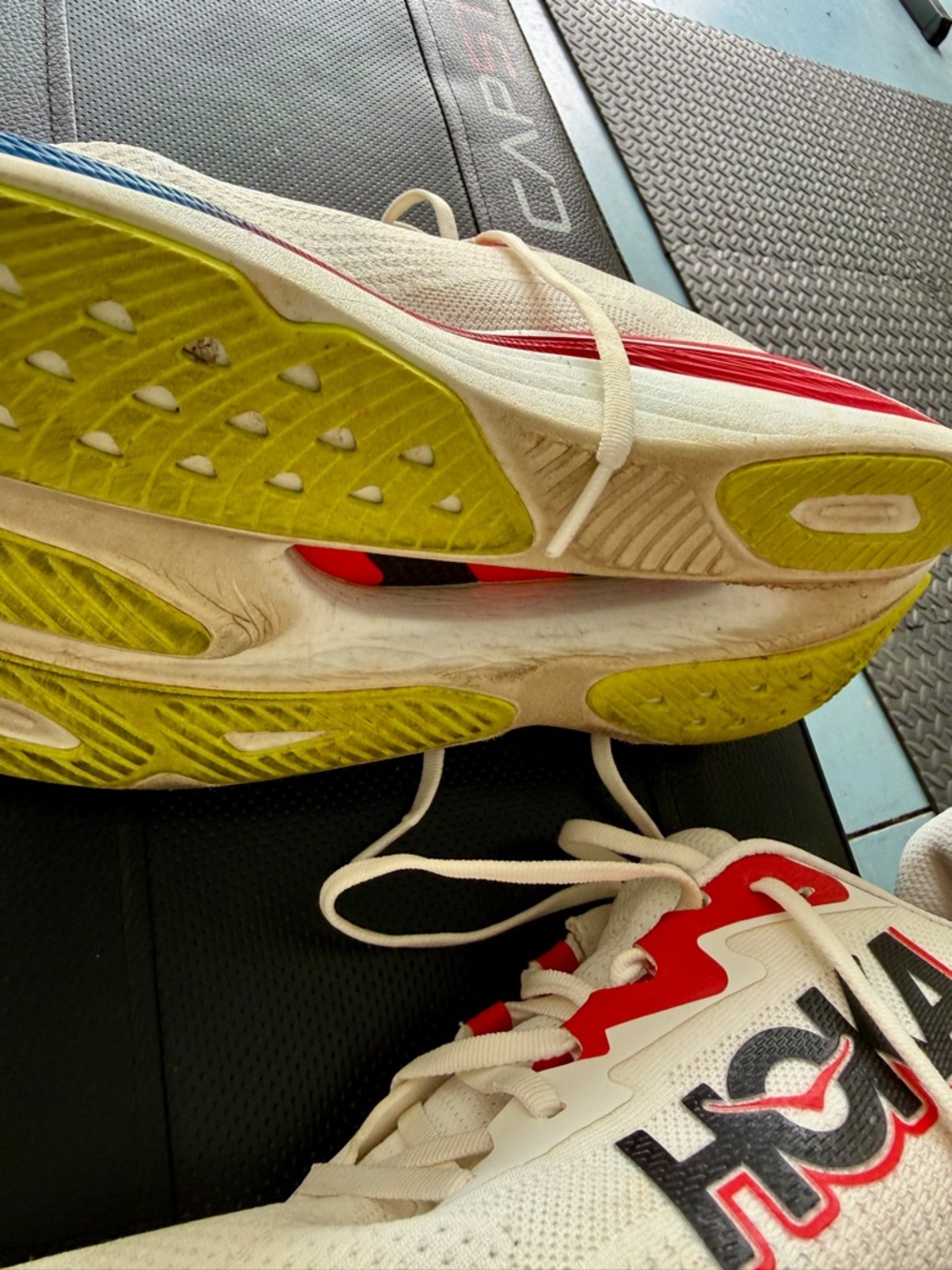 Hoka Men's Cream Running Shoes with Red, Blue and Yellow Accents - Picture 8 of 9